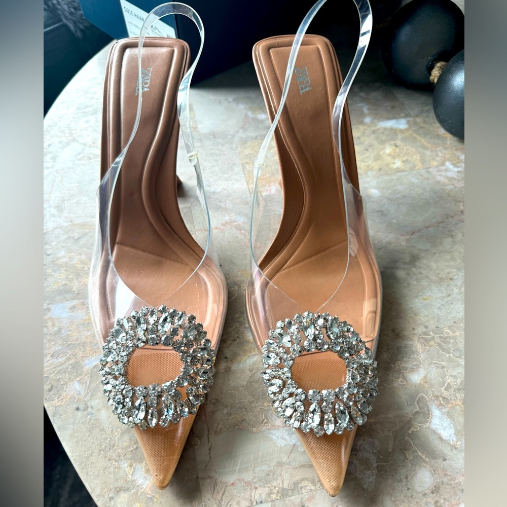 Brand new, never worn. They were a gift and I received two of them on accident